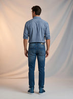 Jeans Slim para caballero con rotos azul medio